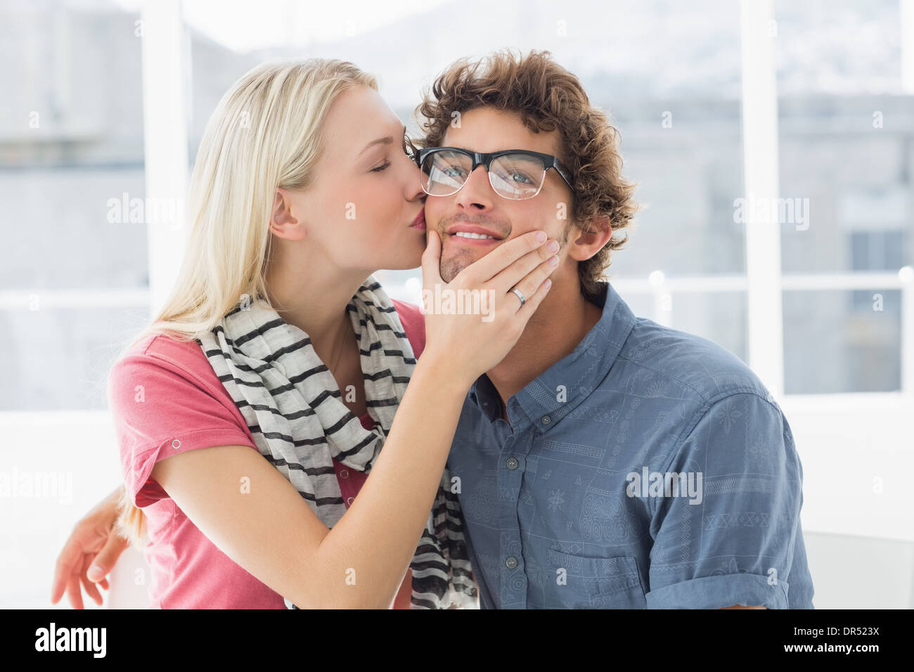 Man Woman Kissing Cheek Hi Res Stock Photography And Images Alamy