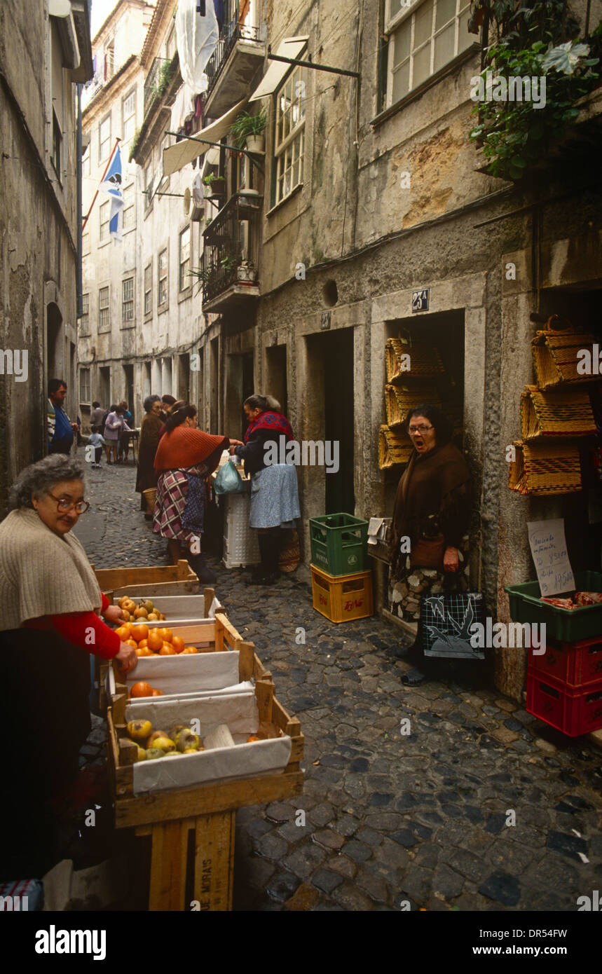 Fruit and buyers in the narrow streets of the Bairro Alto district - or ...