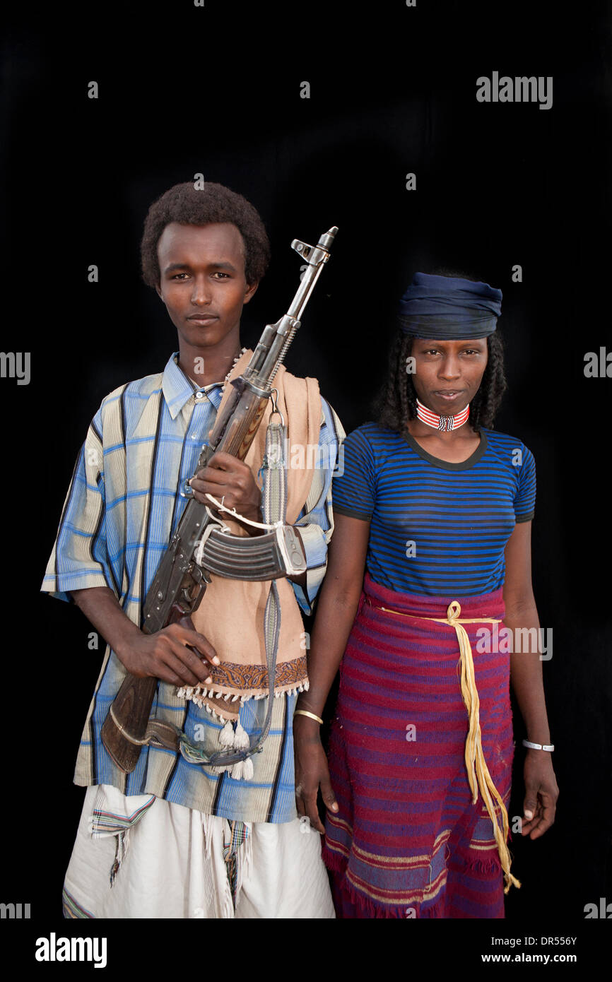 armed man with his bride in Awash, Harar, Ethiopia Stock Photo