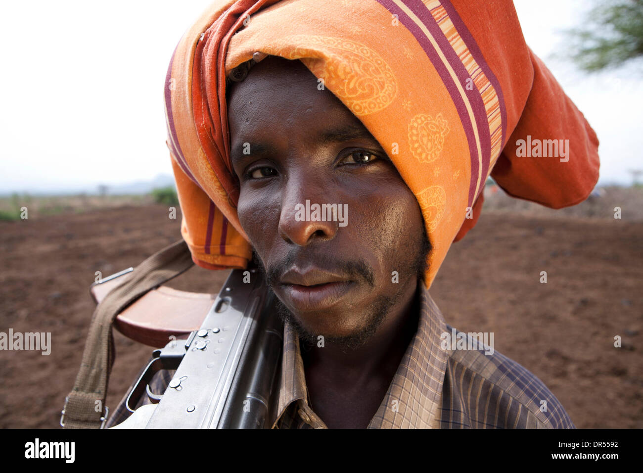 armed young man of the Afari tribe in Awash, Harar, Ethiopia Stock Photo