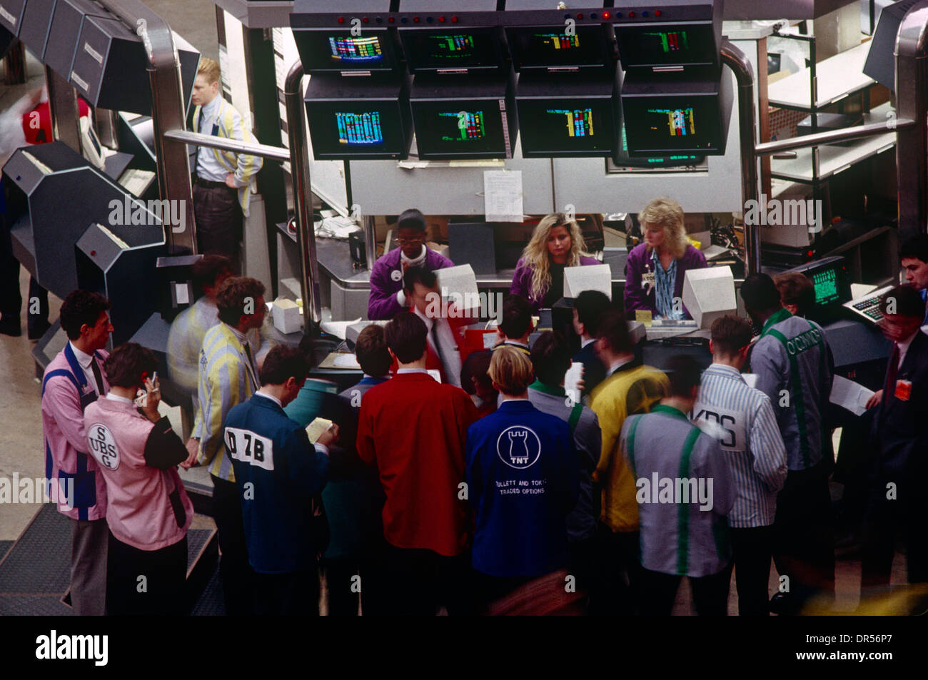 Active trading inside the London Stock Exchange in the City of London during the late-eighties. Stock Photo