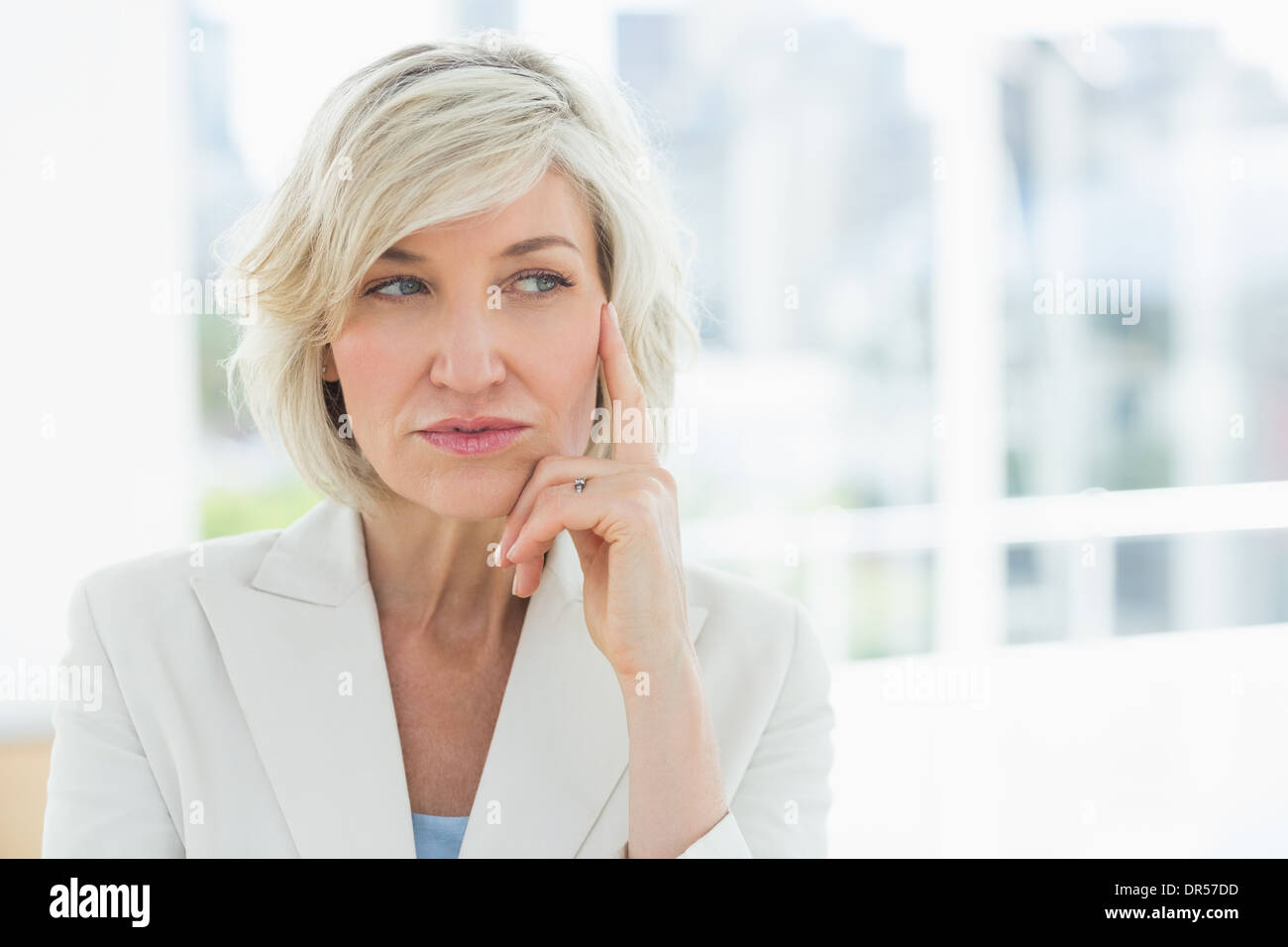 Mature businesswoman looking away Stock Photo