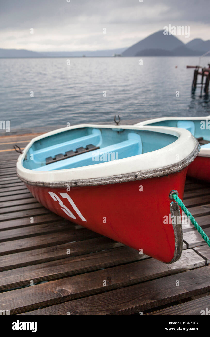 Boats on wooden dock Stock Photo