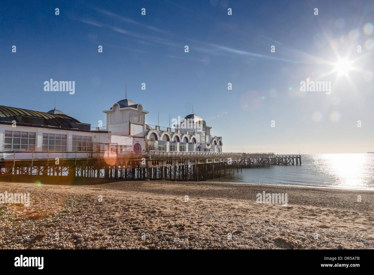 South Parade Pier, Southsea, Hampshire, UK on a sunny day with blue sky, sun and lens flare Stock Photo