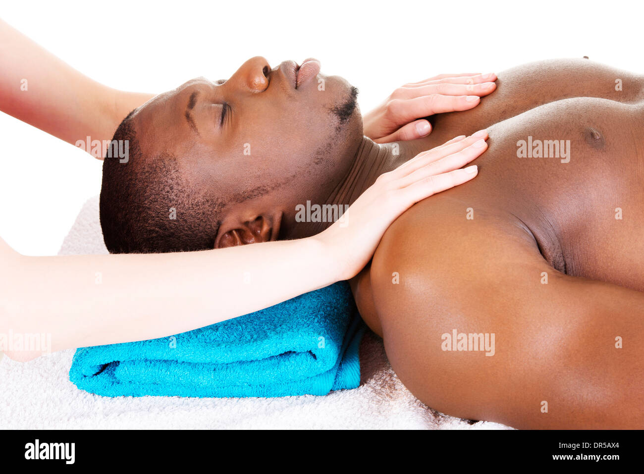 Man receiving massage at spa saloon Stock Photo