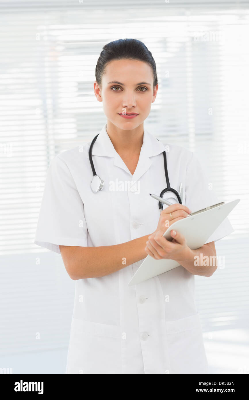 Beautiful young female doctor hi-res stock photography and images - Alamy