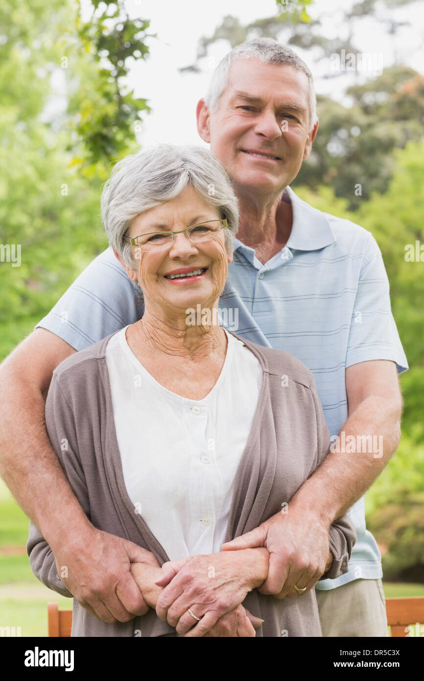 Man arm around woman behind hi-res stock photography and images - Alamy