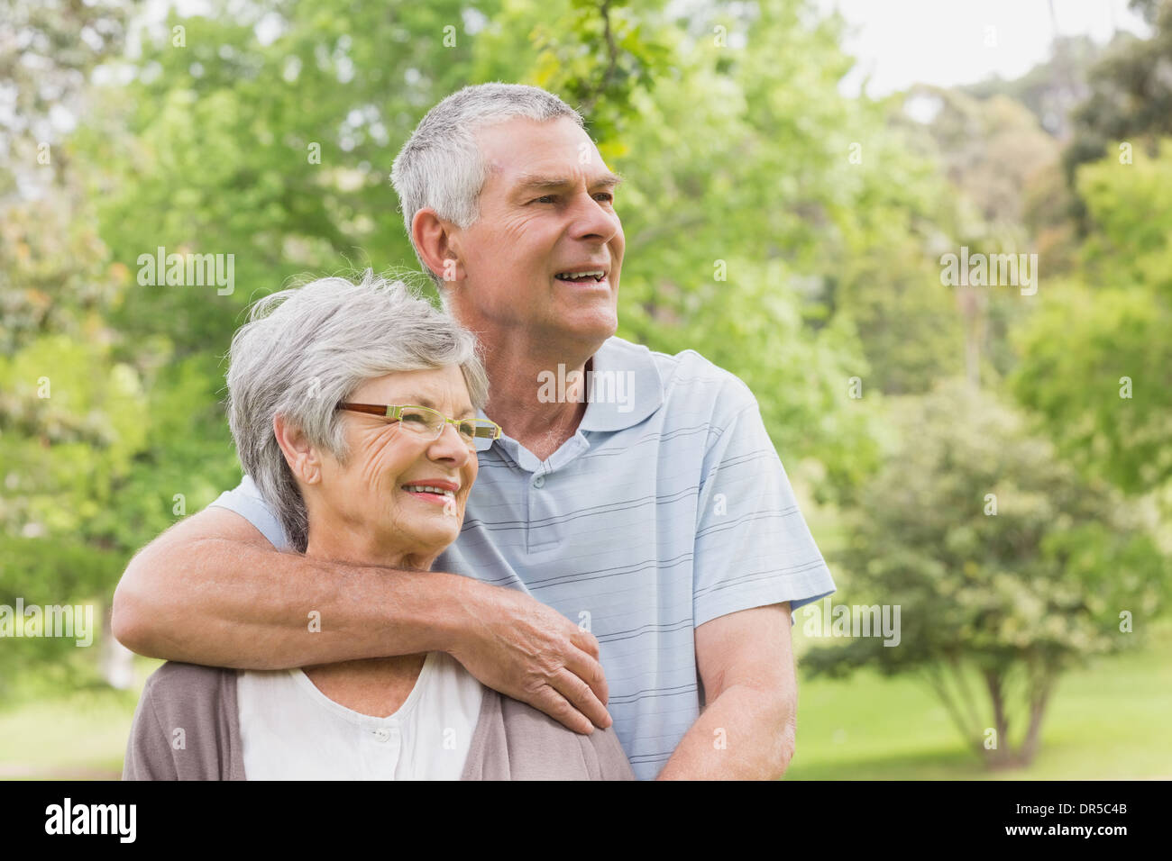 Man arm around woman behind hi-res stock photography and images - Alamy