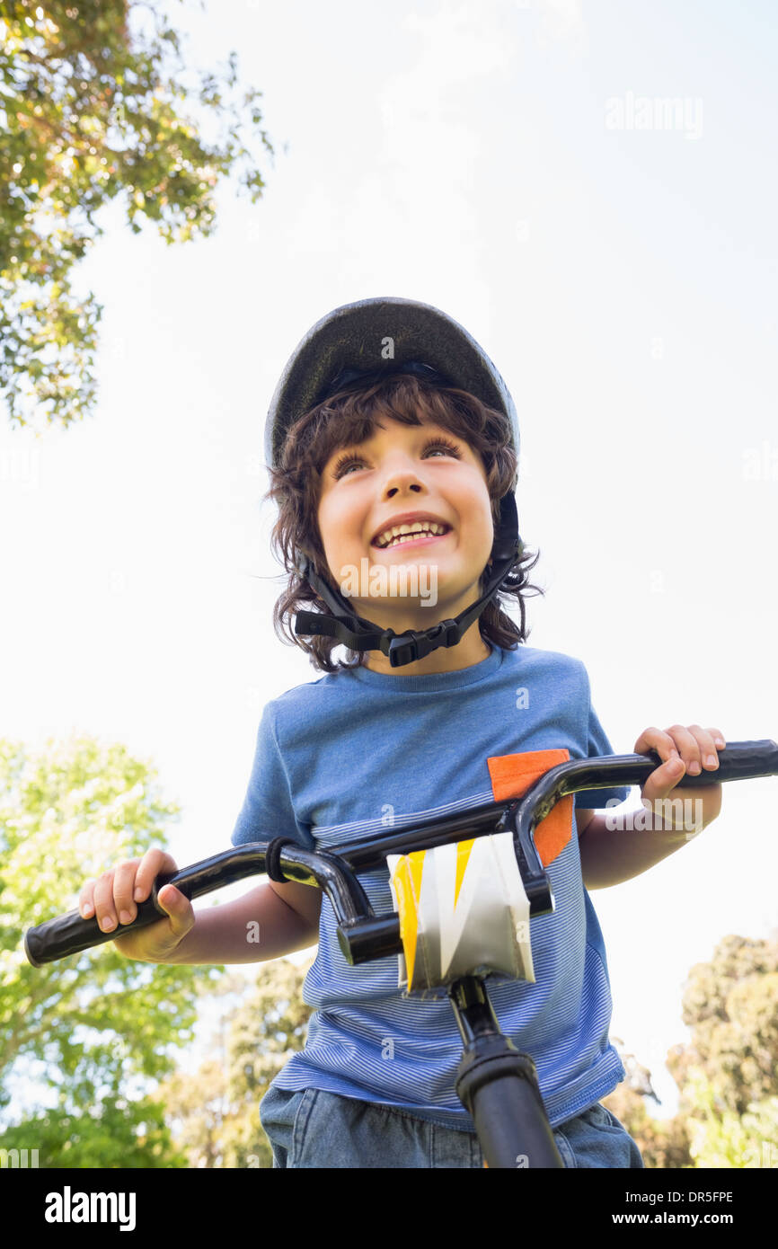 Cute little boy riding a bicycle Stock Photo Alamy
