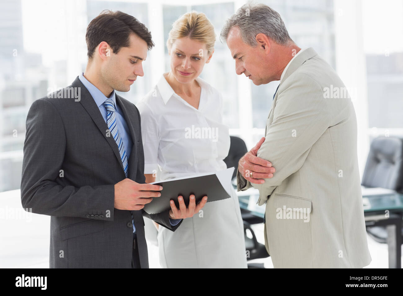 Business team going over documents Stock Photo