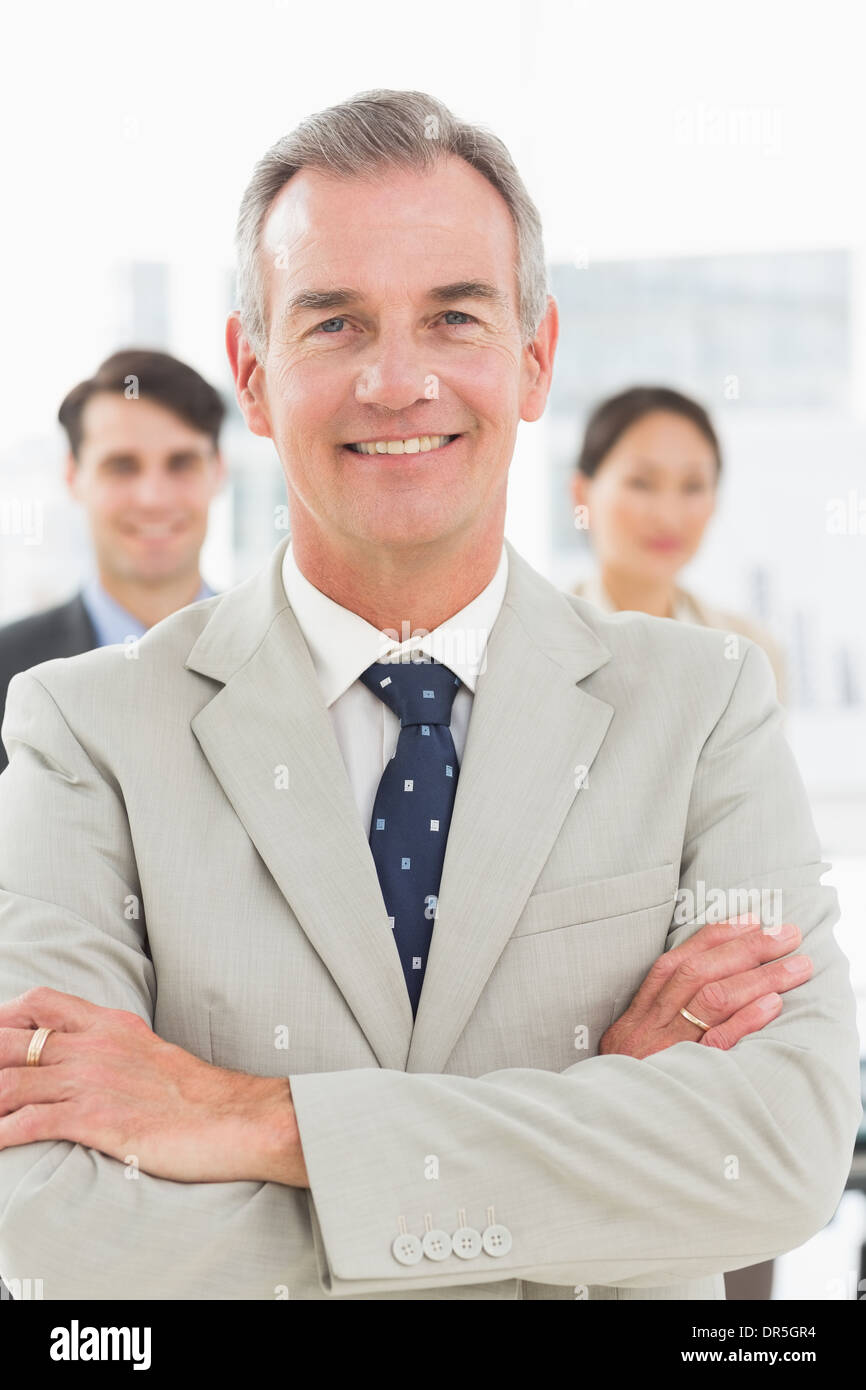 Mature businessman smiling at camera Stock Photo