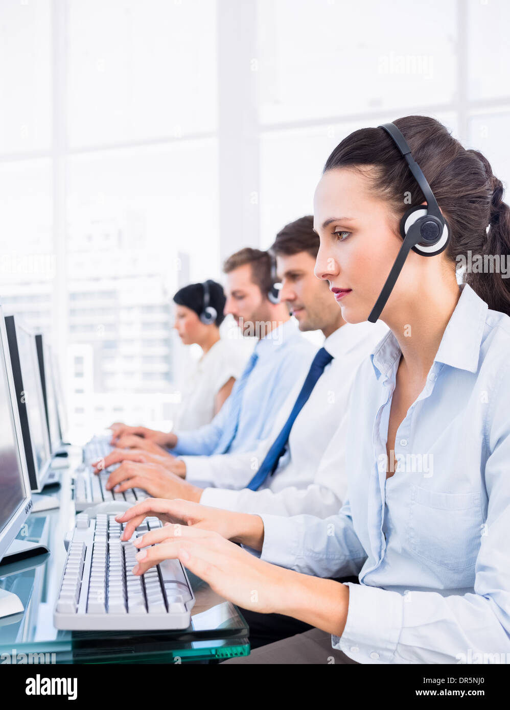 Operator using computers monitor hi-res stock photography and images ...