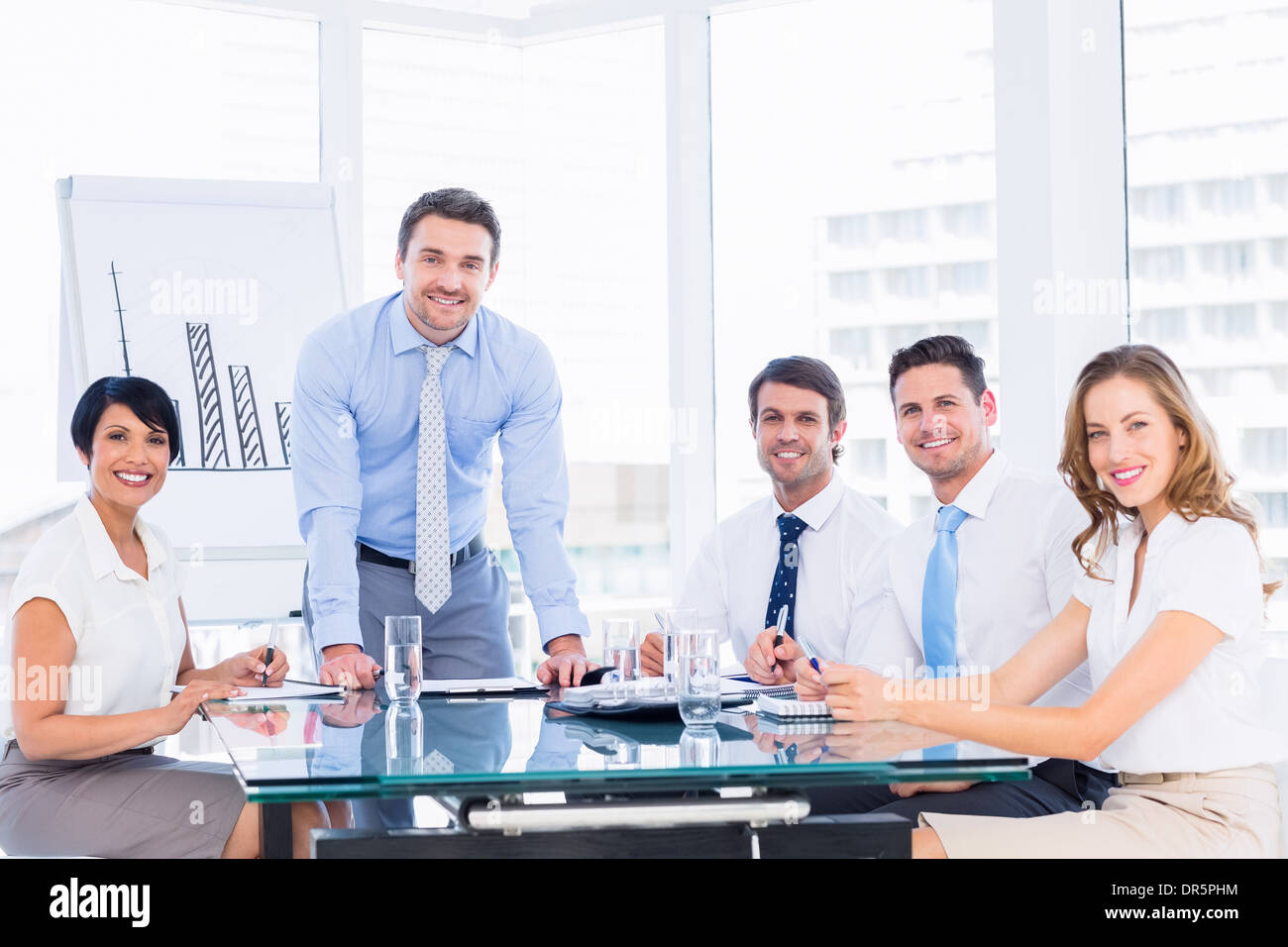 Business people in office at presentation Stock Photo