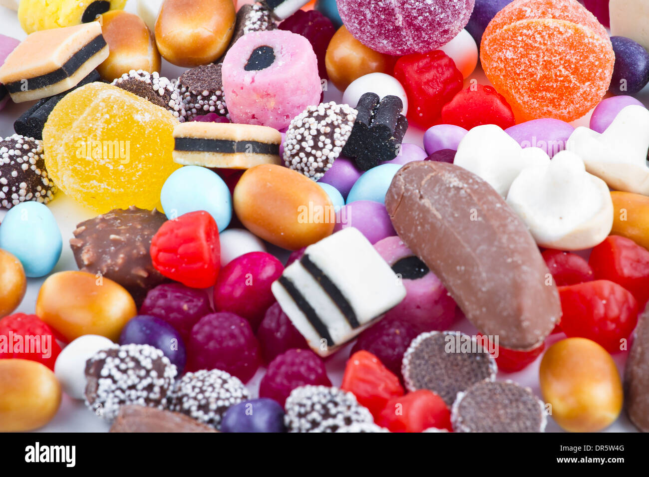 Many candy on white background Stock Photo - Alamy