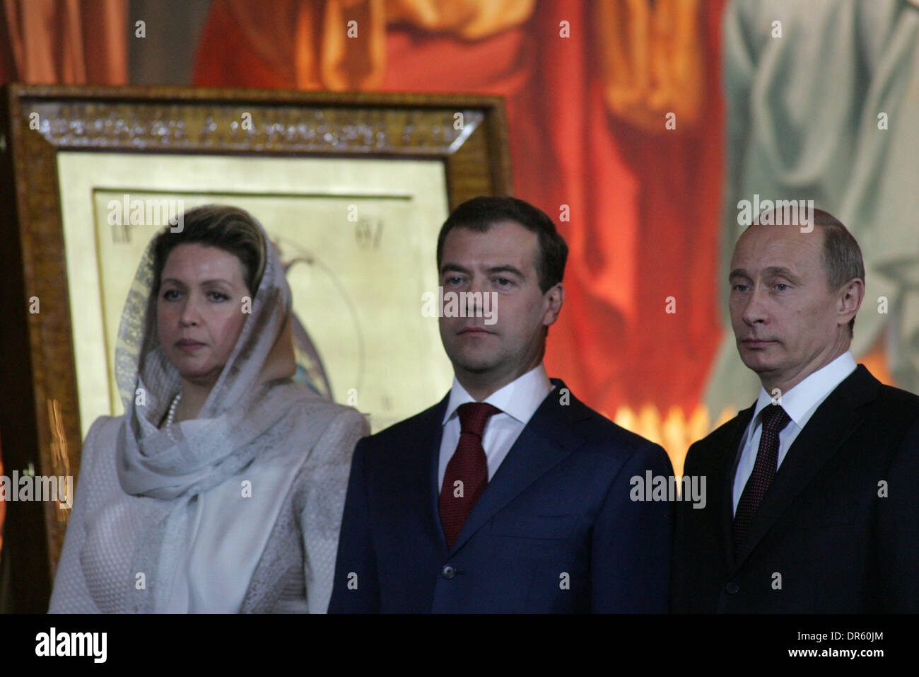 Apr 19, 2009 - Moscow, Russia - Prime Minister of Russia VLADIMIR PUTIN (c) and President DMITRY MEDVEDEV with wife Svetlana (L) get Easter blessing at Orthodox ceremony at the Christ the Savior Cathedral in Moscow. (Credit Image: © PhotoXpress/ZUMA Press) Stock Photo