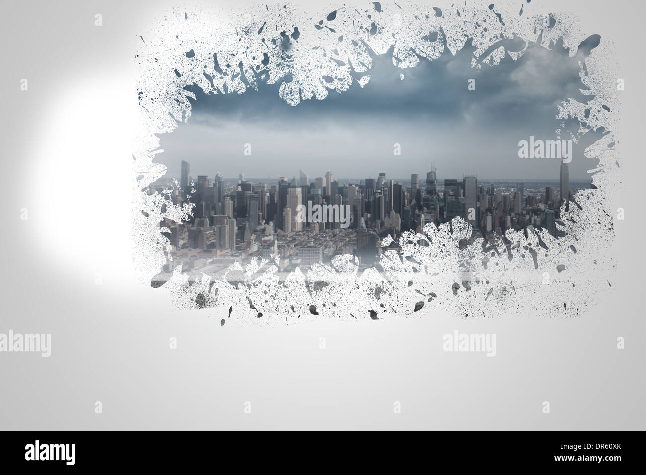 Splash on wall revealing cityscape Stock Photo
