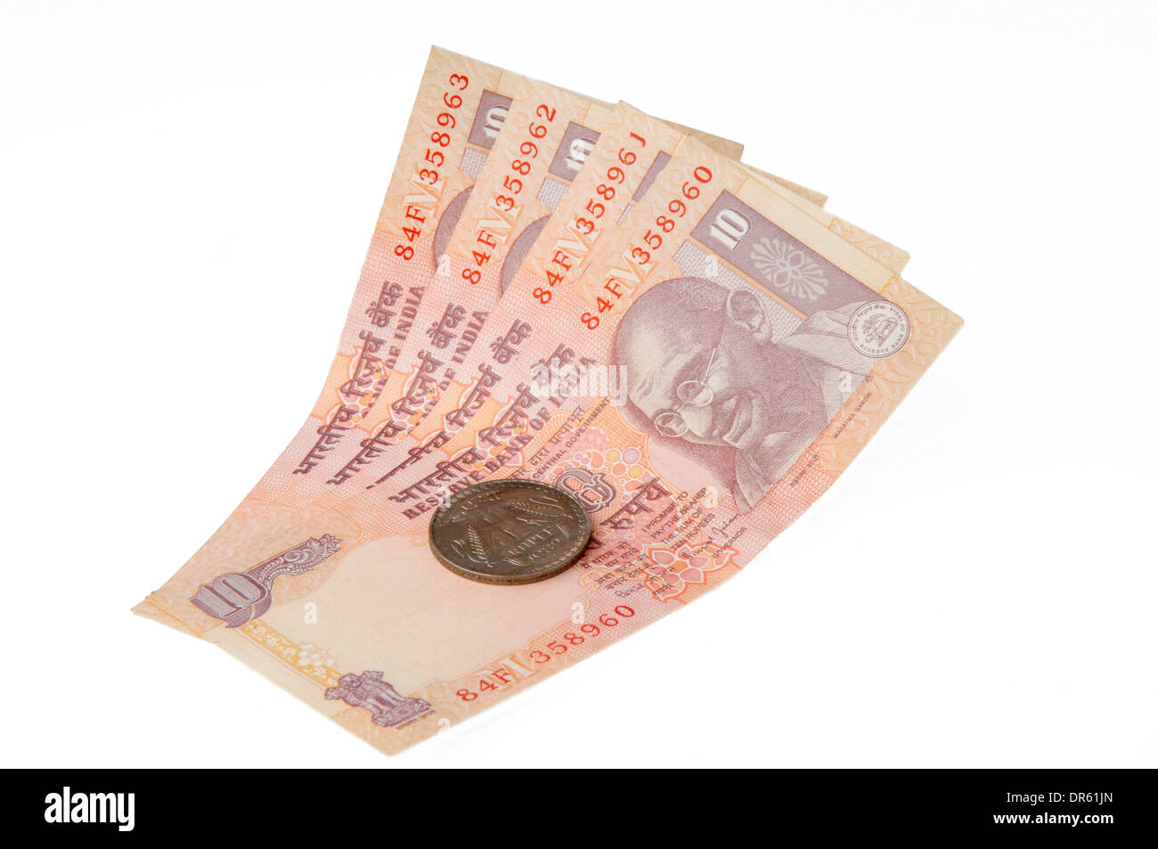 A ten rupee notes and One rupee coin ,Indian Currency Stock Photo