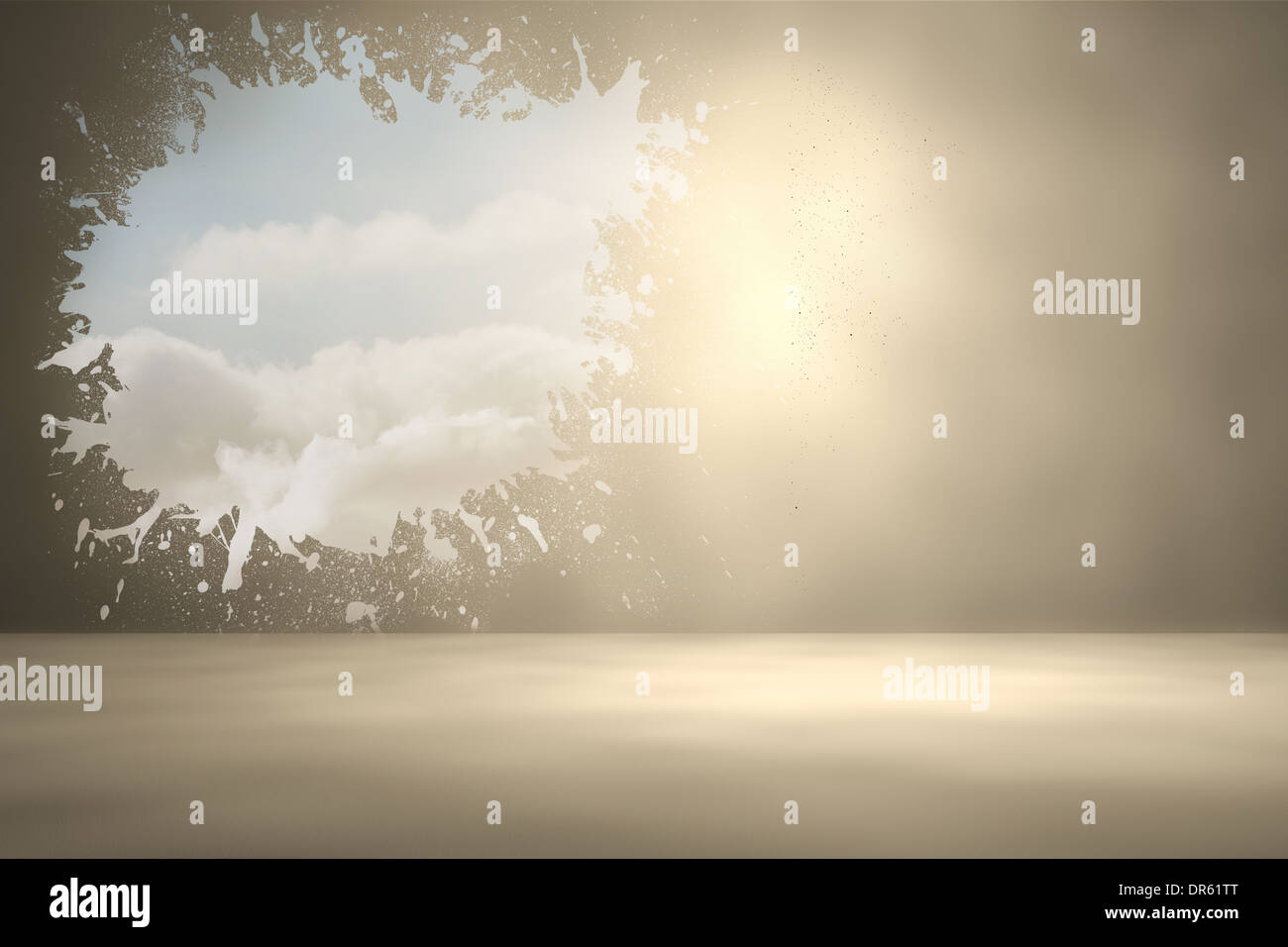 Splash on wall revealing bright sky Stock Photo