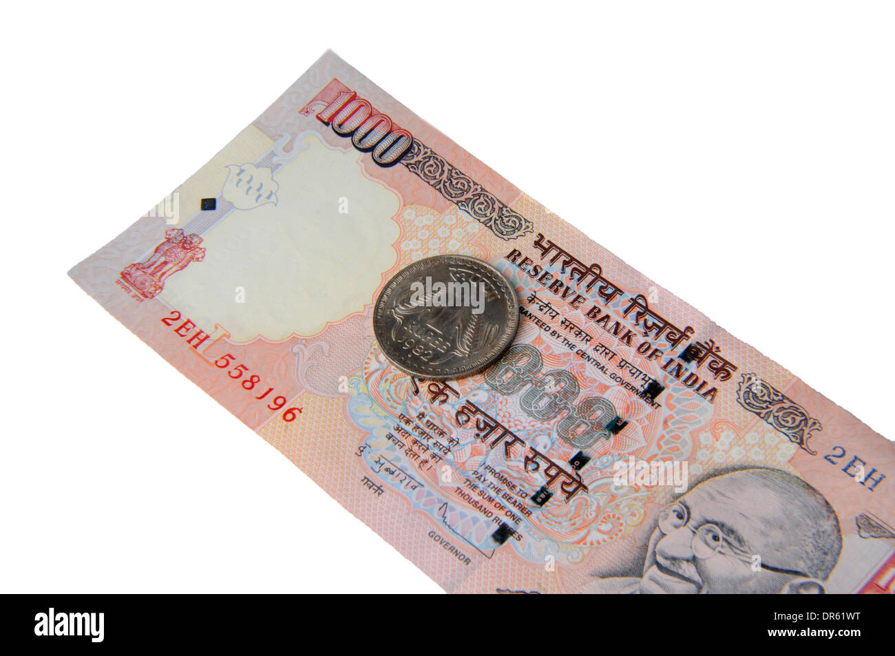 A one thousand rupee notes and One rupee coin ,Indian Currency Stock Photo