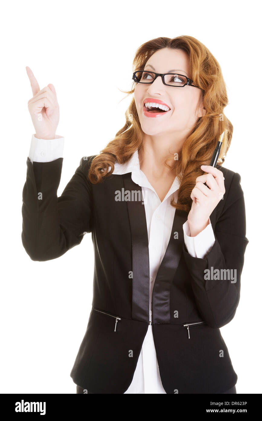 Happy business woman showing copy space, isolated on white Stock Photo ...