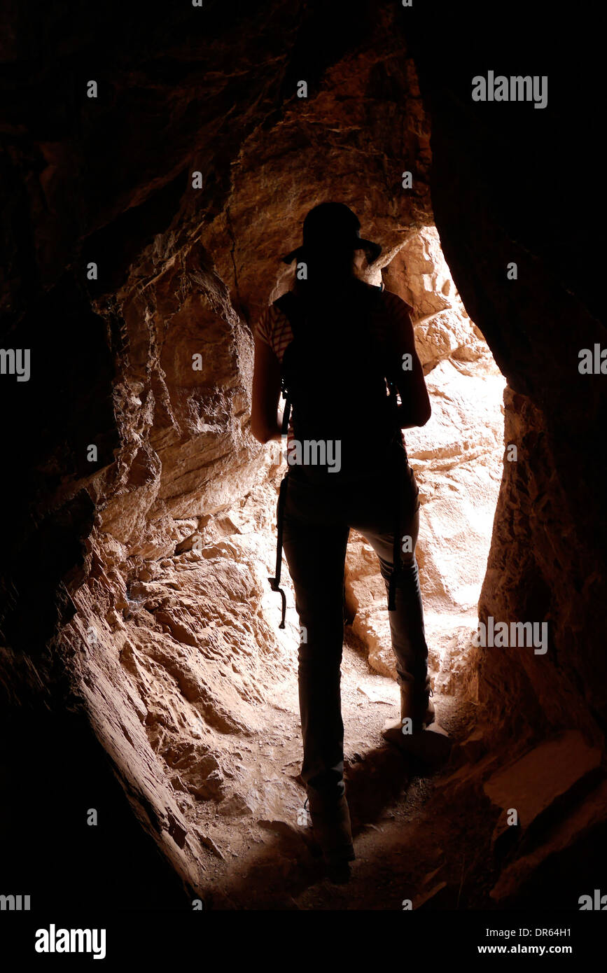 Exiting a rock tunnel Stock Photo - Alamy