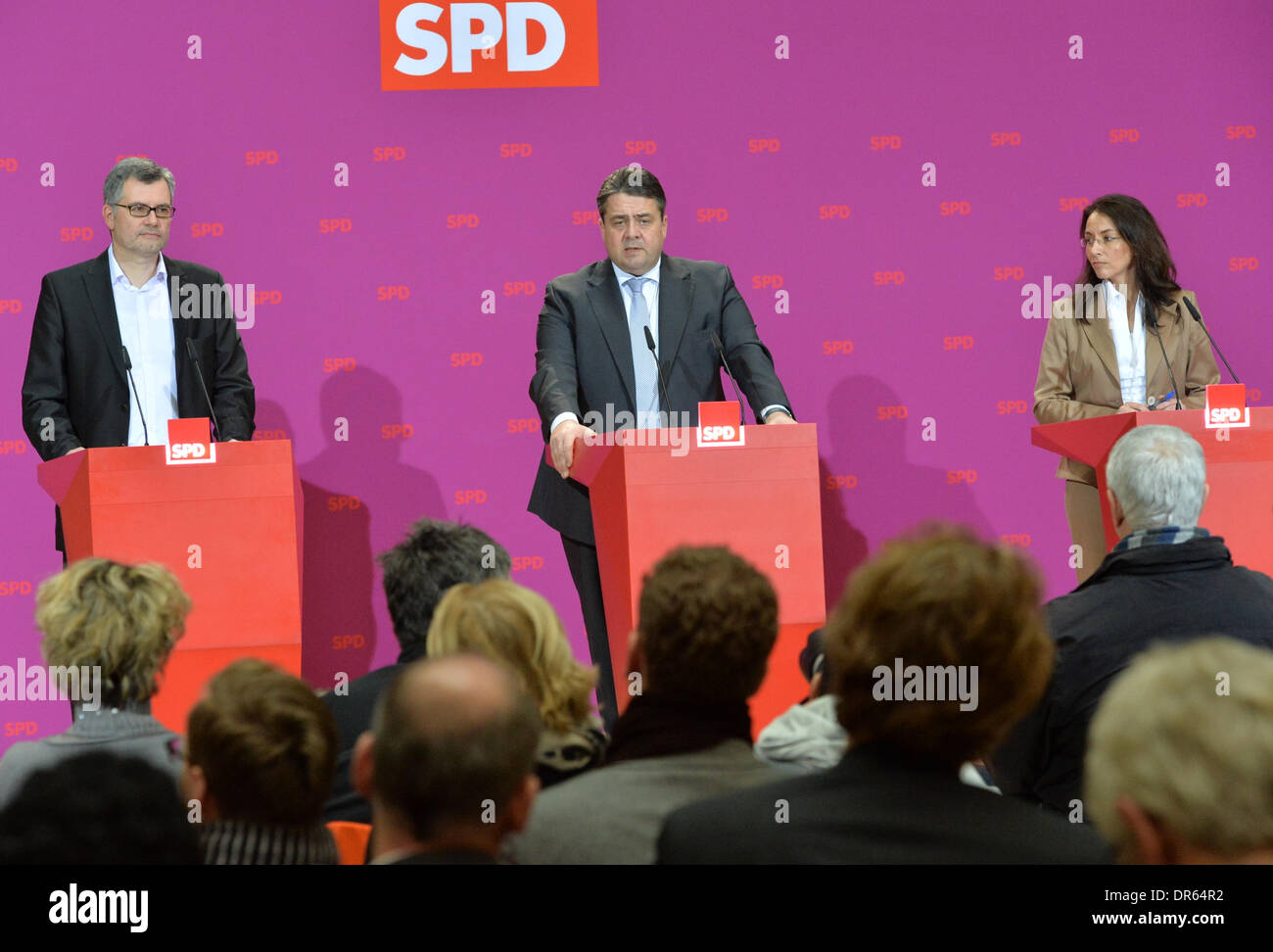 Berlin, Germany. 20th Jan, 2014. Chairman of the Social Democratic Party of Germany (SPD) Sigmar Gabriel (C) presents the designated secretary-general of the SPD, Yasmin Fahimi, and the designated treasurer of the SPD, Dietmar Nietan, during a press conference after the meeting of the party executive committee in Berlin, Germany, 20 January 2014. Fahimi and Nietan are supposed to be elected into office at a special party conference next Sunday. Photo: MARC TIRL/dpa/Alamy Live News Stock Photo