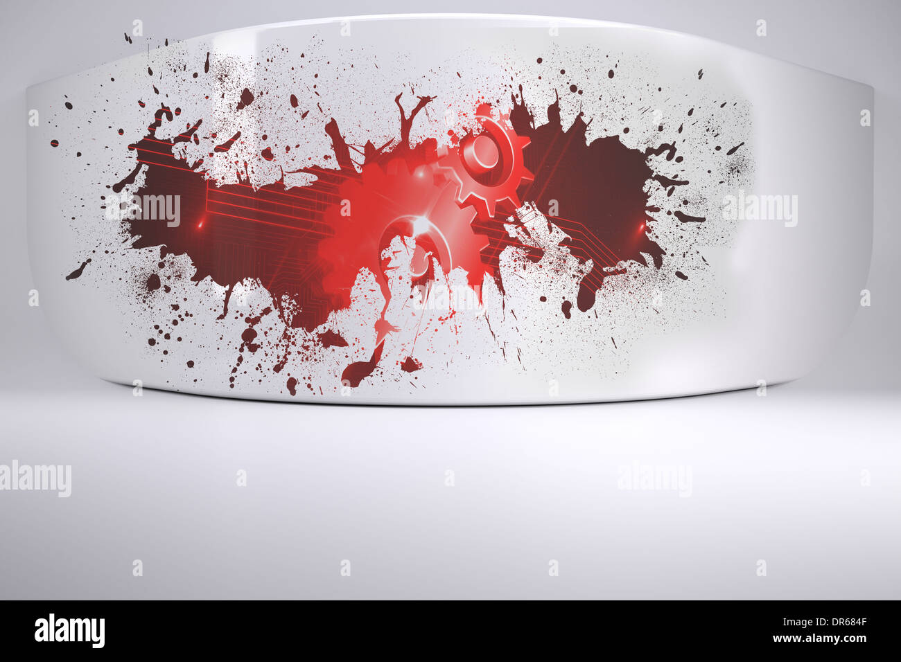 Splash on wall revealing red cogs and wheels Stock Photo