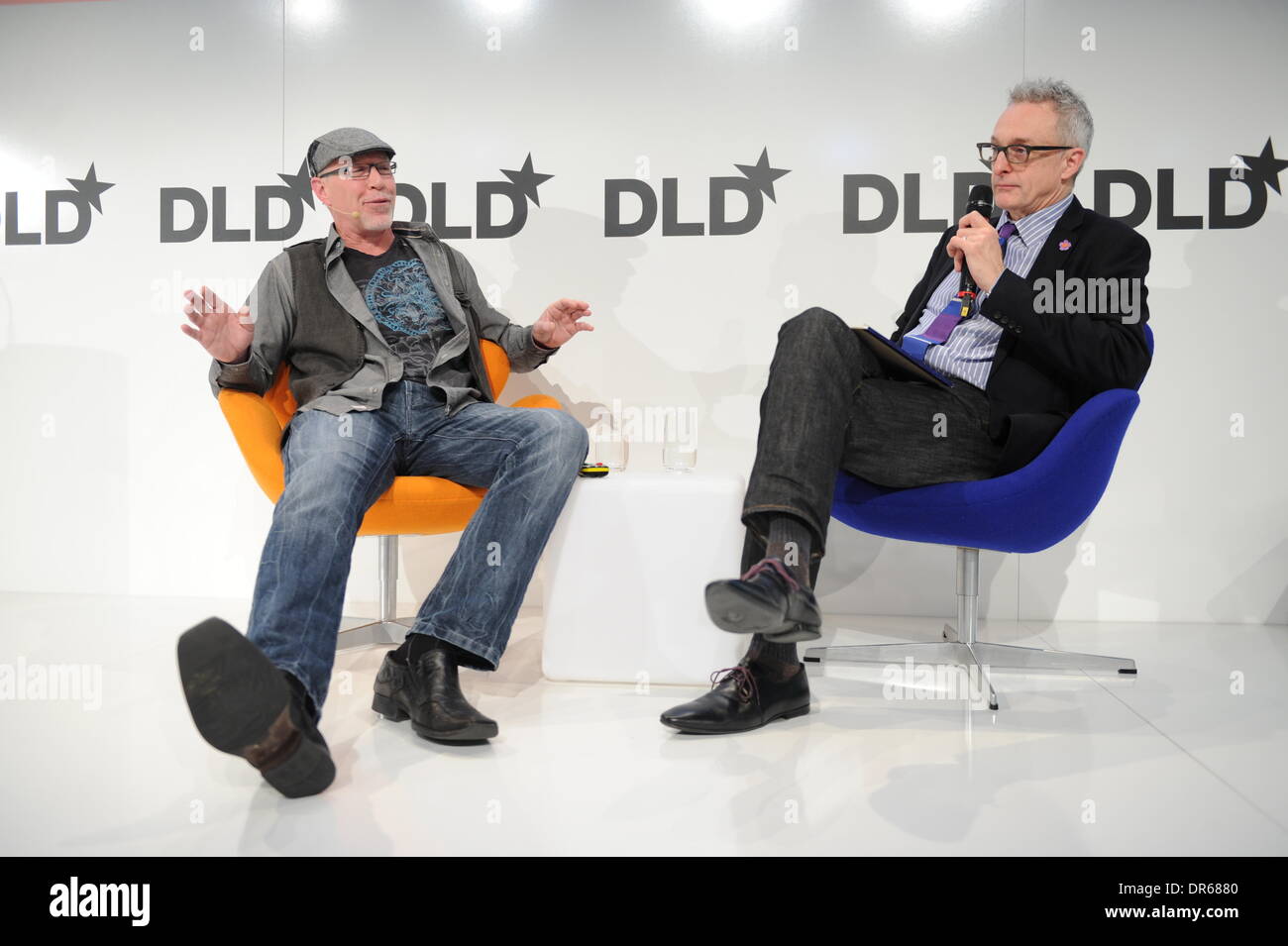 MUNICH/GERMANY - JANUARY 20: David Kirkpatrick (Techonomy, r.) speaks with James Whittaker (Microsoft, l.) on the podium during the Digital Life Design (DLD) Conference at the HVB Forum on January 20, 2014 in Munich, Germany. DLD is a global network on innovation, digitization, science and culture which connects business, creative and social leaders, opinion-formers and influencers for crossover conversation and inspiration. (Photo: picture alliance / Jan Haas) Stock Photo