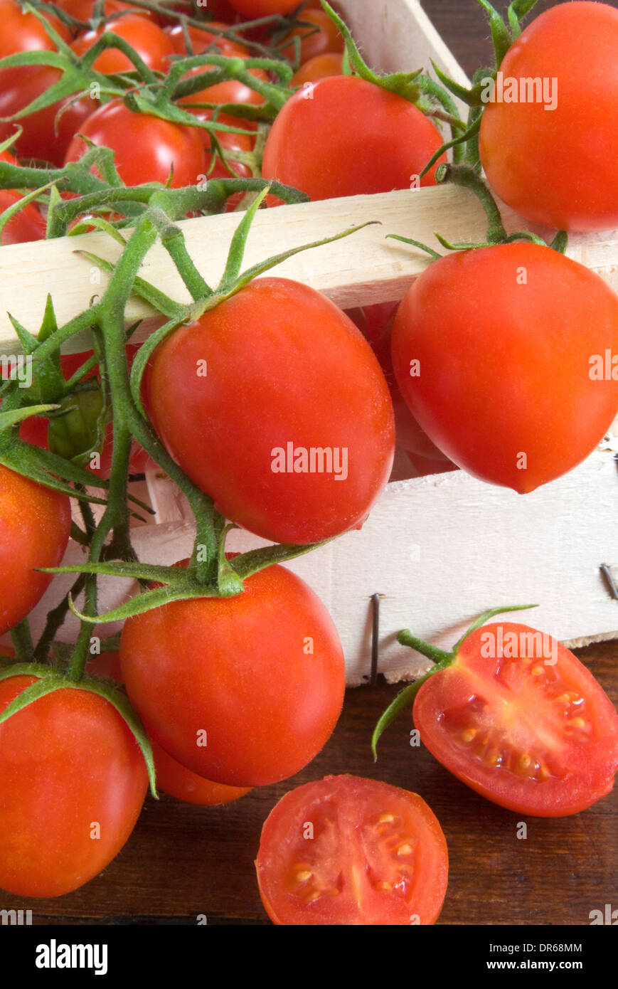 Cherry Tomatoes in a wooden box Stock Photo