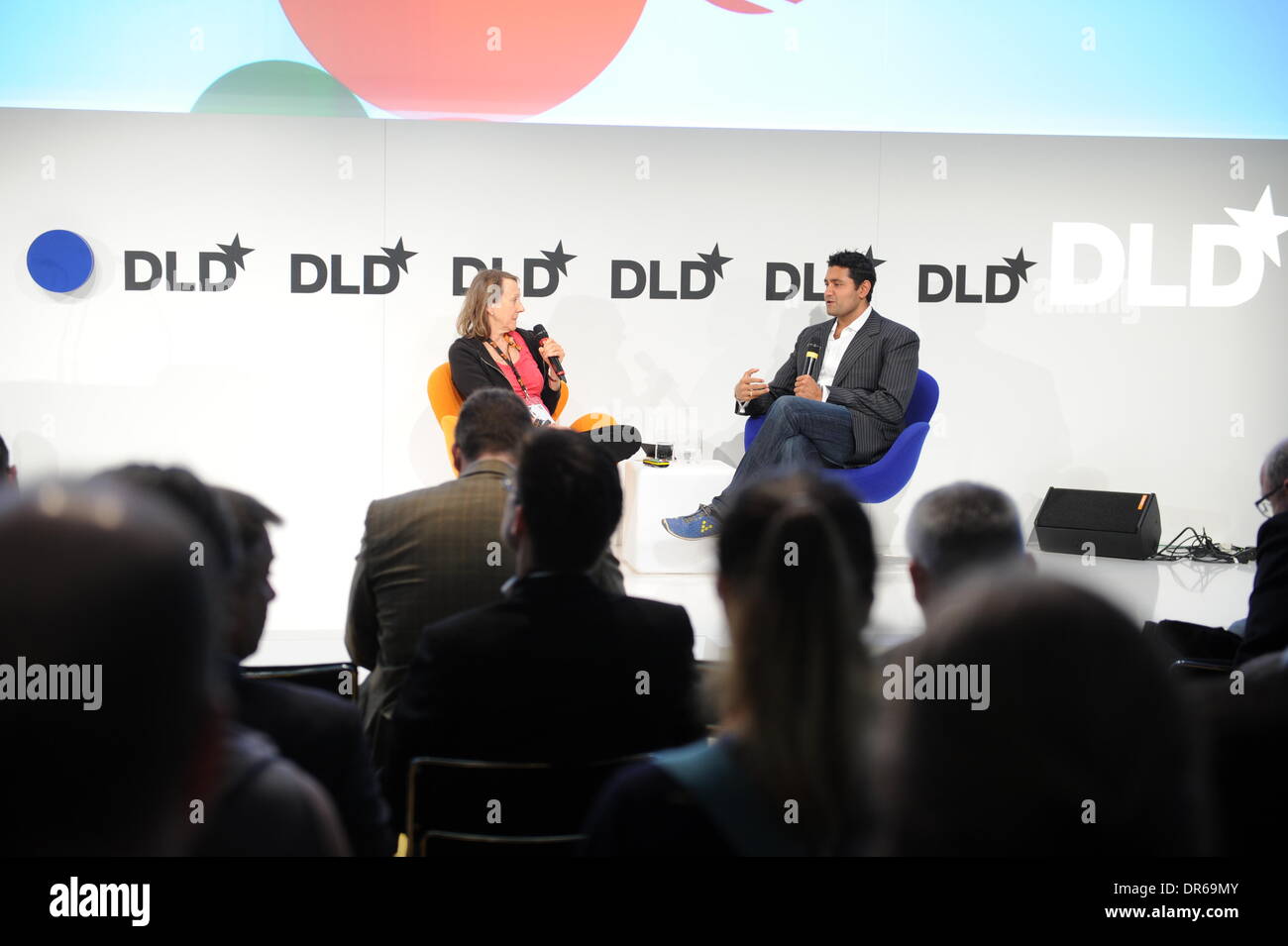 Munich, Germany. 20th Jan, 2014. MUNICH/GERMANY - JANUARY 20: Esther Dyson(Edventure, l.) talks with Shyam Sankar (Palantir) on the podium during the Digital Life Design (DLD) Conference at the HVB Forum on January 20, 2014 in Munich, Germany. DLD is a global network on innovation, digitization, science and culture which connects business, creative and social leaders, opinion-formers and influencers for crossover conversation and inspiration. (Photo: picture alliance / Jan Haas)/dpa/Alamy Live News Stock Photo