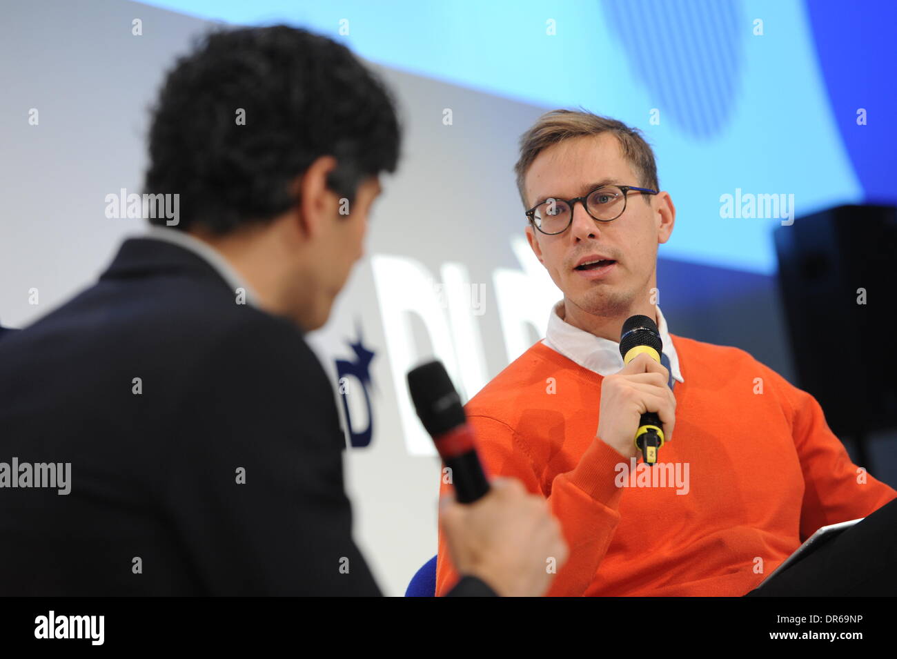 Munich, Germany. 20th Jan, 2014. MUNICH/GERMANY - JANUARY 20: Nicholas Carlson(Business Insider, r.) talks with Jeremy Stoppelman (Yelp) on a panel discussion during the Digital Life Design (DLD) Conference at the HVB Forum on January 20, 2014 in Munich, Germany. DLD is a global network on innovation, digitization, science and culture which connects business, creative and social leaders, opinion-formers and influencers for crossover conversation and inspiration. (Photo: picture alliance / Jan Haas)/dpa/Alamy Live News Stock Photo