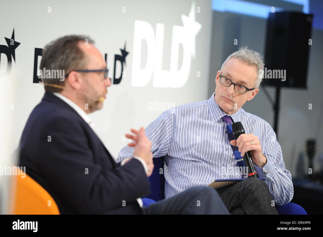 Munich, Germany. 20th Jan, 2014. MUNICH/GERMANY - JANUARY 20: Jimmy Wales (Wikipedia, l.) in talks with David Kirckpatrick (Technomy) on the podium during the Digital Life Design (DLD) Conference at the HVB Forum on January 20, 2014 in Munich, Germany. DLD is a global network on innovation, digitization, science and culture which connects business, creative and social leaders, opinion-formers and influencers for crossover conversation and inspiration. (Photo: picture alliance / Jan Haas)/dpa/Alamy Live News Stock Photo