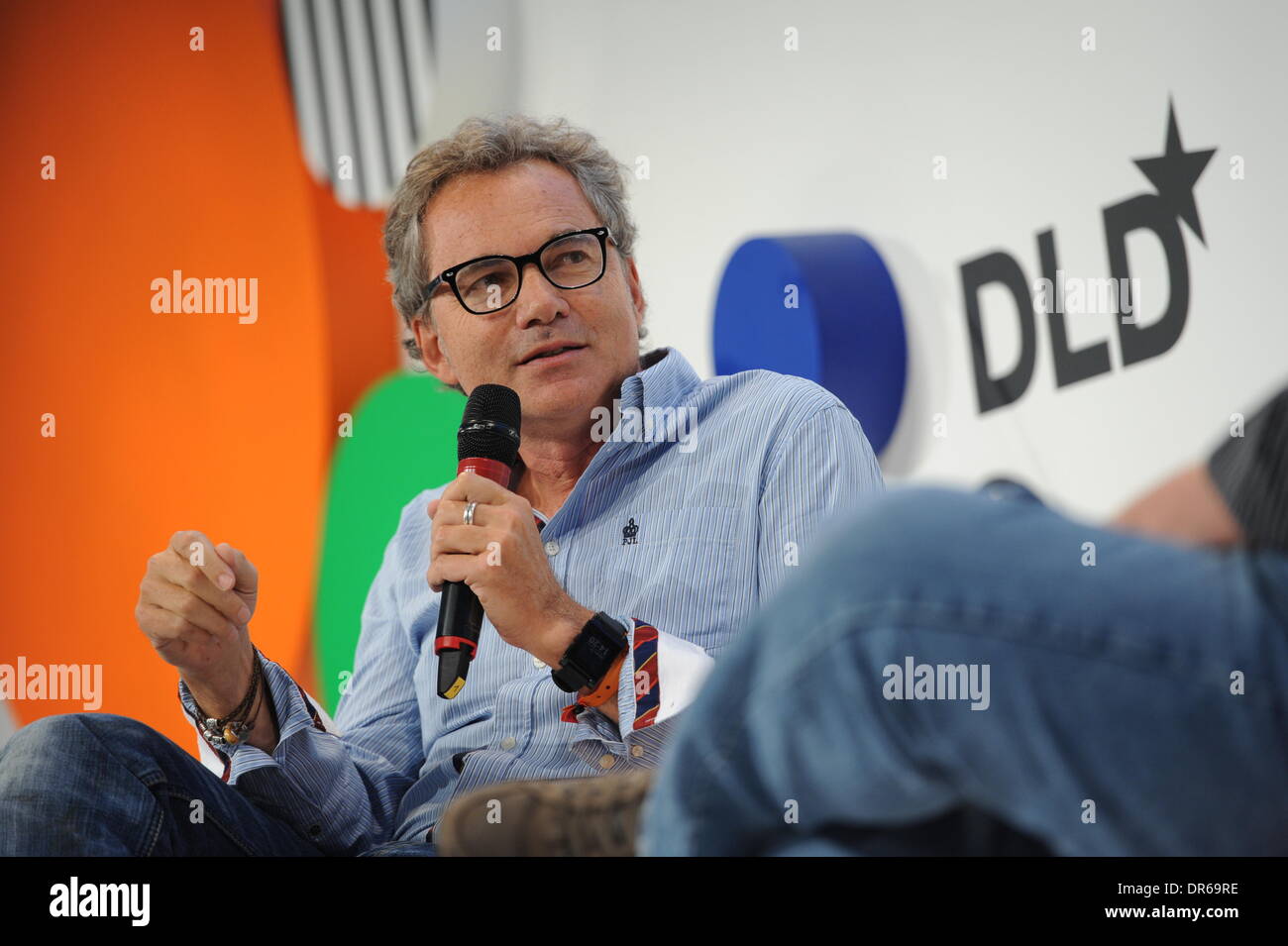 MUNICH/GERMANY - JANUARY 20: Martin Varsavsky (Fon) speaks on the podium during the Digital Life Design (DLD) Conference at the HVB Forum on January 20, 2014 in Munich, Germany. DLD is a global network on innovation, digitization, science and culture which connects business, creative and social leaders, opinion-formers and influencers for crossover conversation and inspiration. (Photo: picture alliance / Jan Haas) Stock Photo