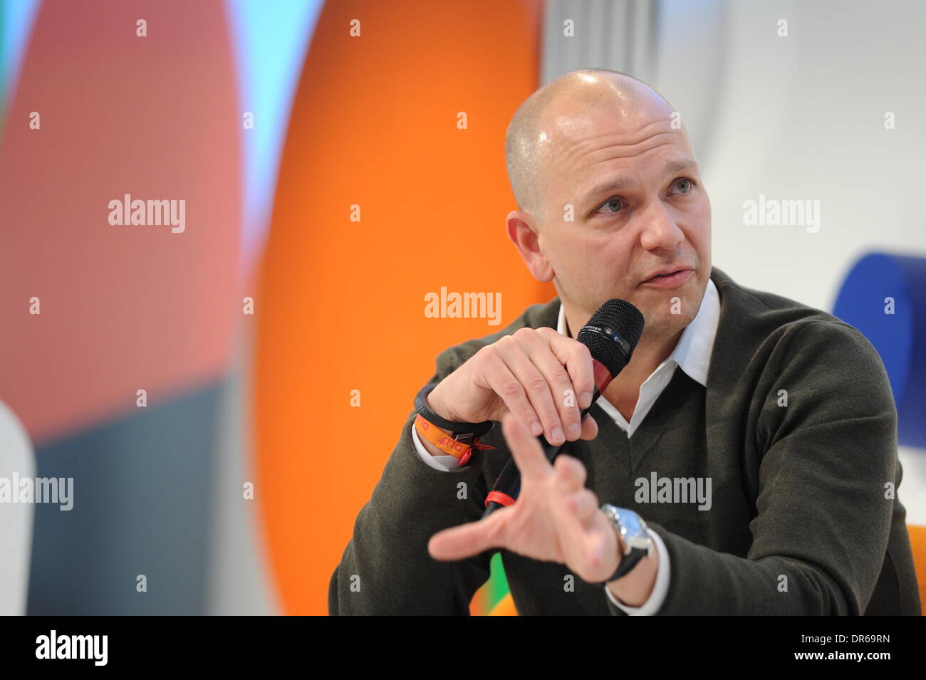 MUNICH/GERMANY - JANUARY 20: Tony Fadell (Nest Labs) gestures on a panel discussion during the Digital Life Design (DLD) Conference at the HVB Forum on January 20, 2014 in Munich, Germany. DLD is a global network on innovation, digitization, science and culture which connects business, creative and social leaders, opinion-formers and influencers for crossover conversation and inspiration. (Photo: picture alliance / Jan Haas) Stock Photo