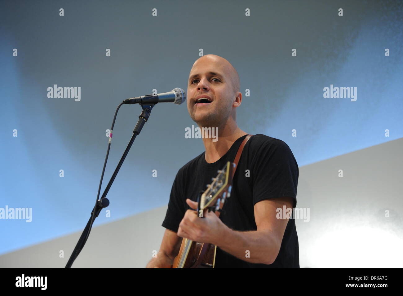 MUNICH/GERMANY - JANUARY 20: Belgian Singer Milow performs during the Digital Life Design (DLD) Conference at the HVB Forum on January 20, 2014 in Munich, Germany. DLD is a global network on innovation, digitization, science and culture which connects business, creative and social leaders, opinion-formers and influencers for crossover conversation and inspiration. (Photo: picture alliance / Jan Haas) Stock Photo