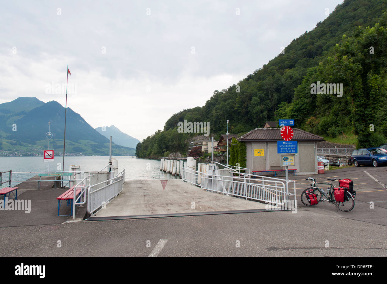 Ferry departure pier across Lake Lucerne (Vierwaldstättersee) near Gersau in the Swiss Alps Stock Photo