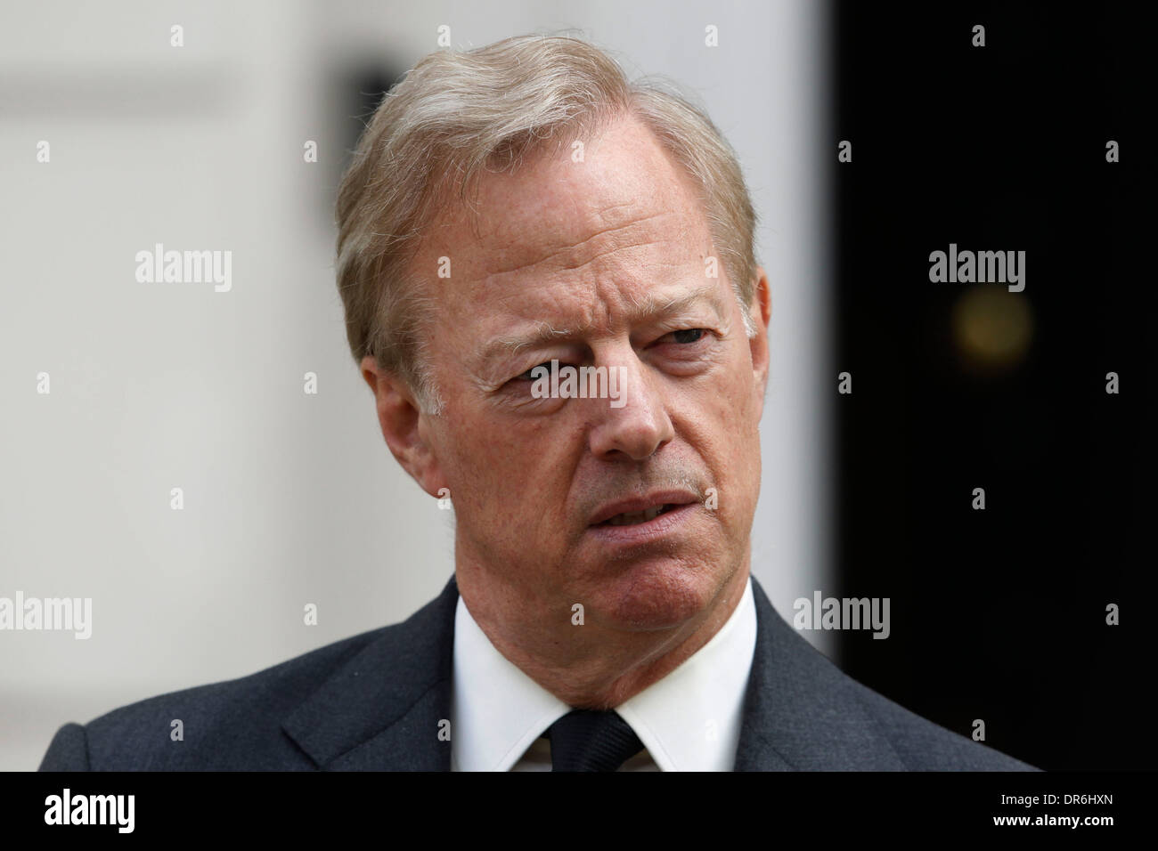 Sir Mark Thatcher, Baroness Thatcher's son pay respects to his mom when he gives a statement to the media outside her house on A Stock Photo