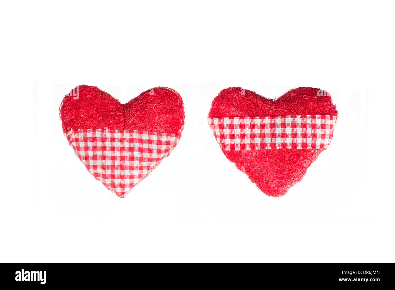 Two Heart Shaped Pillows Isolated On A White Studio Background Stock Photo
