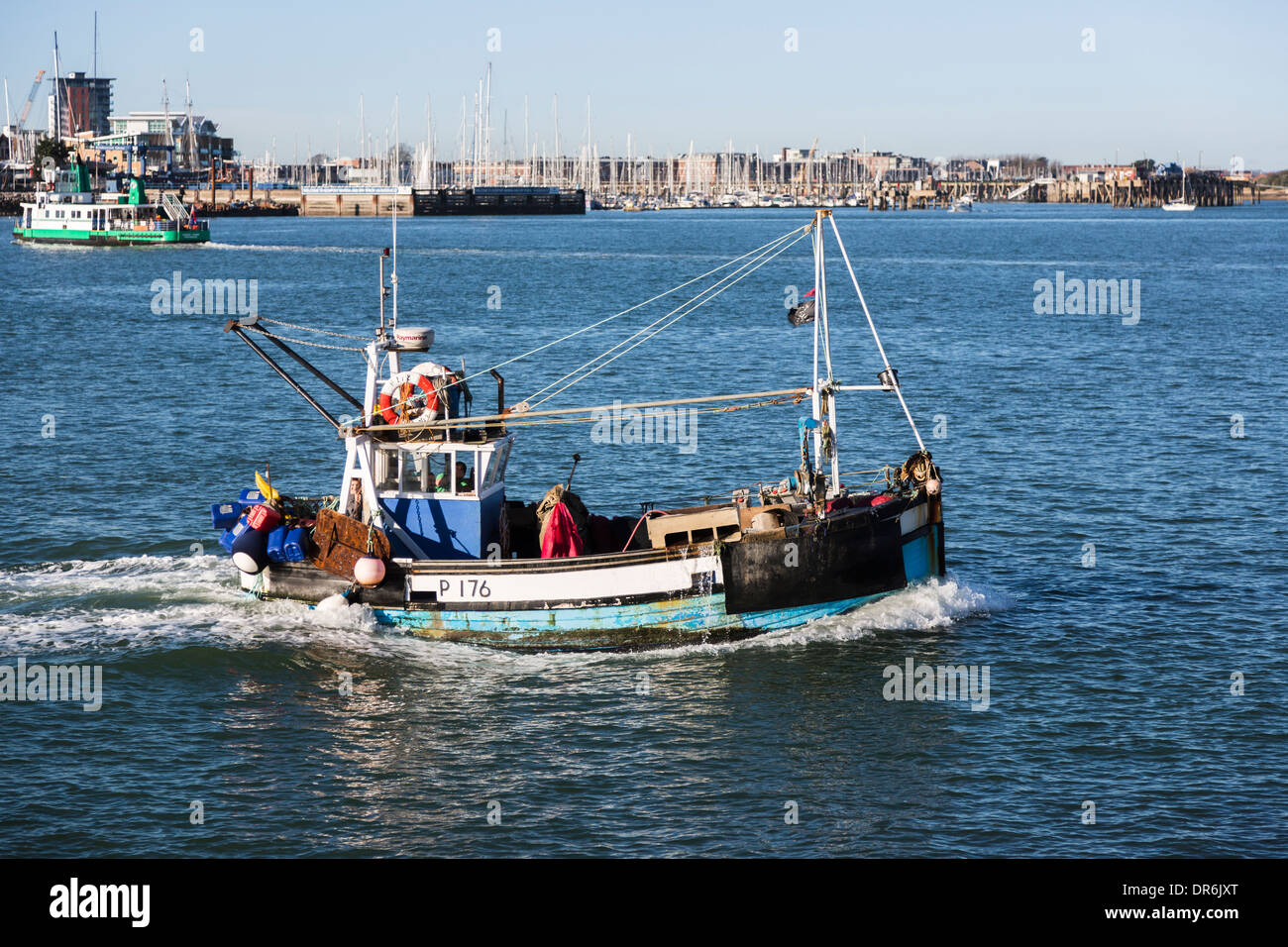 Fishing boat sailing in Portsmouth Harbour, the Solent, Hants, UK on a