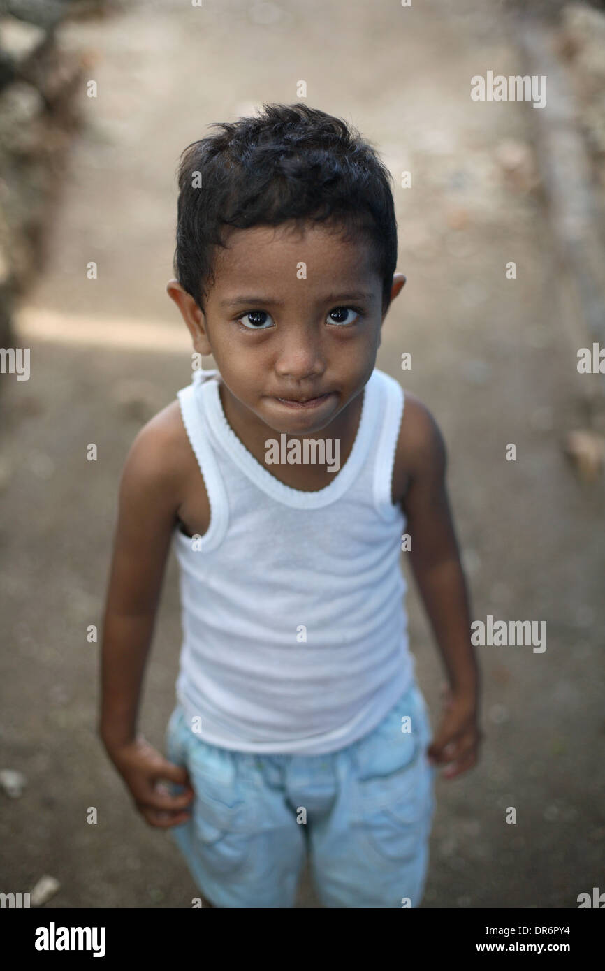 Portrait of young Indonesian boy, from a family living in poverty, Kupang, West Timor, Indonesia. 2005 Stock Photo