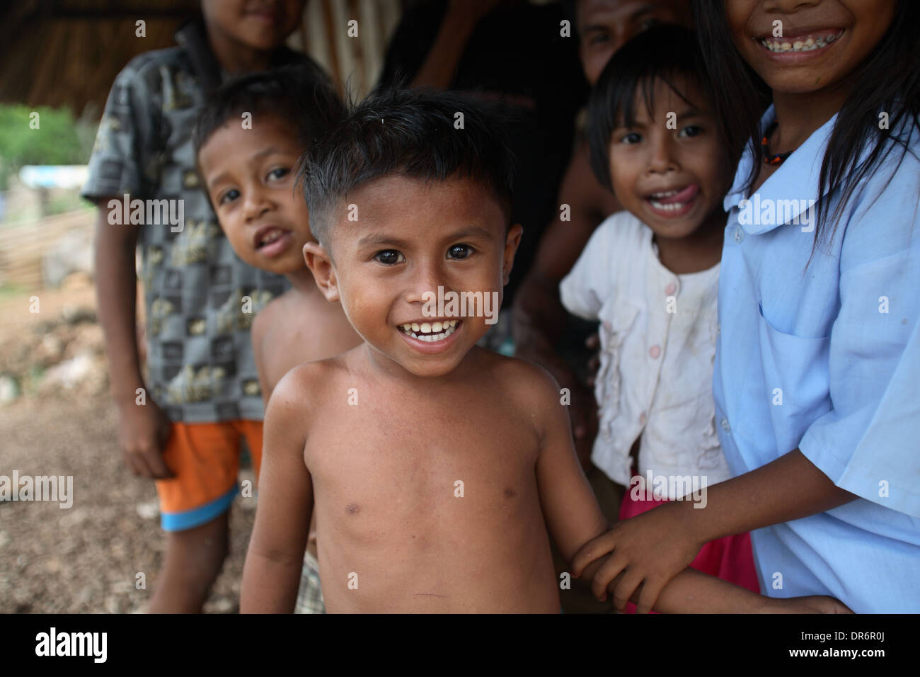 Portrait of smiling Indonesian children from a family living in poverty.  Kupang, West Timor, Indonesia. Nov 2005 Stock Photo