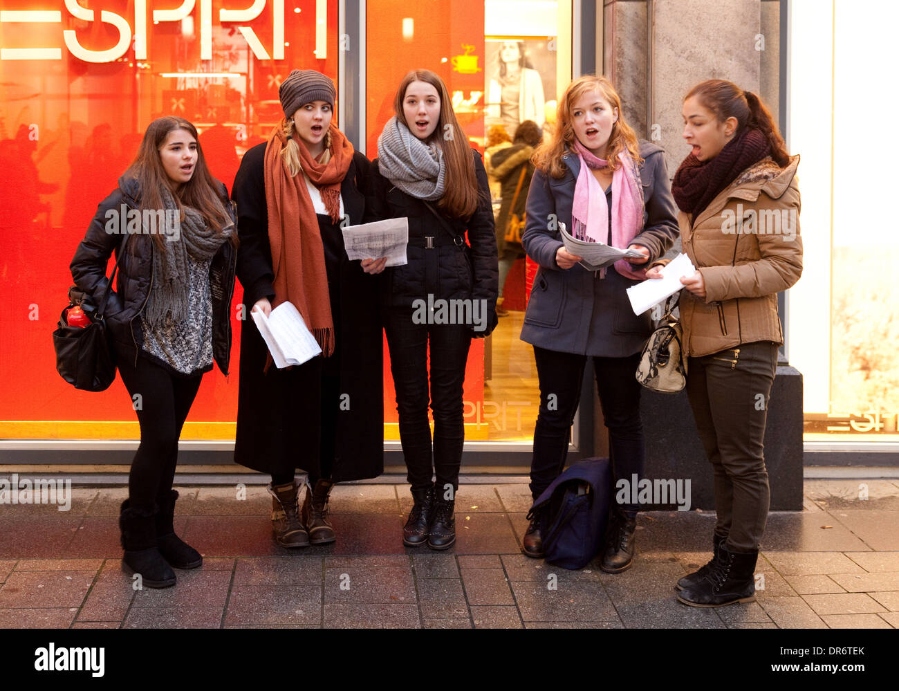 Christmas Carol singers five women singing carols on the street