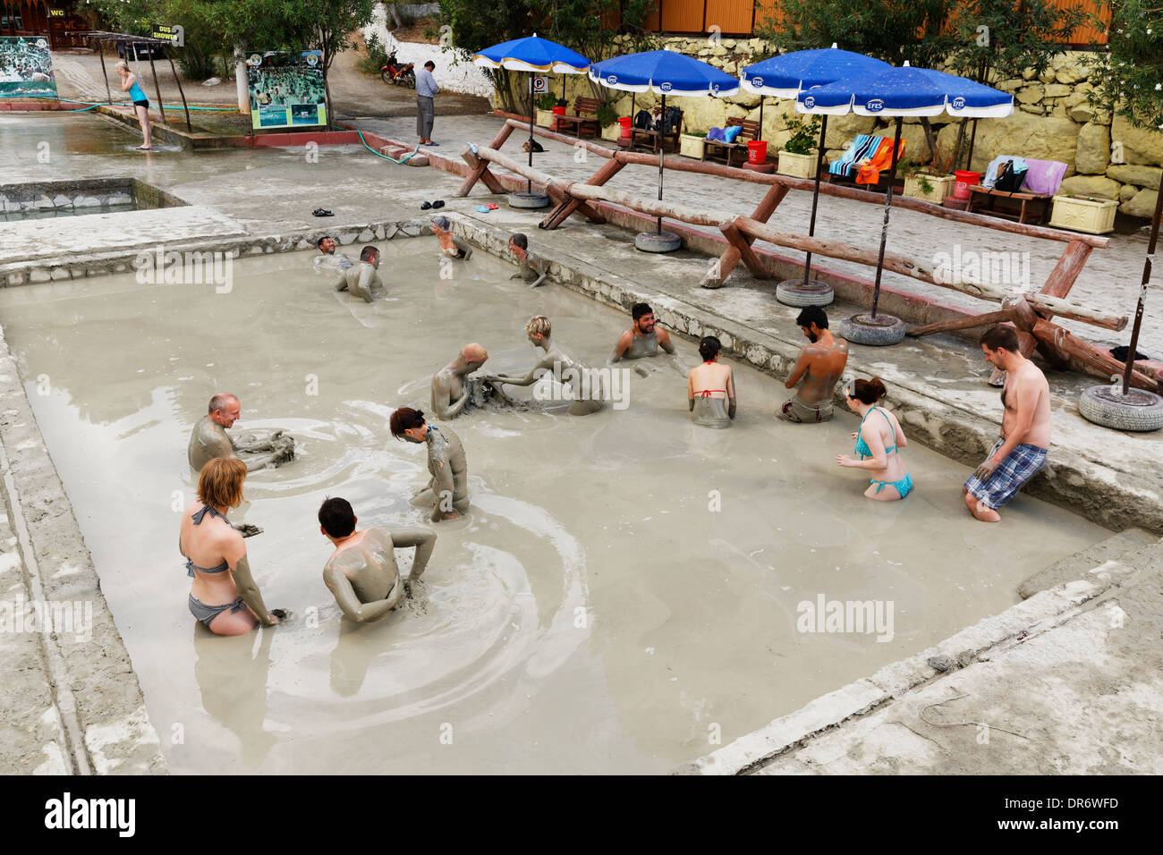 Turkey, Province Mugla, People taking a mud bath at Sultaniye thermal