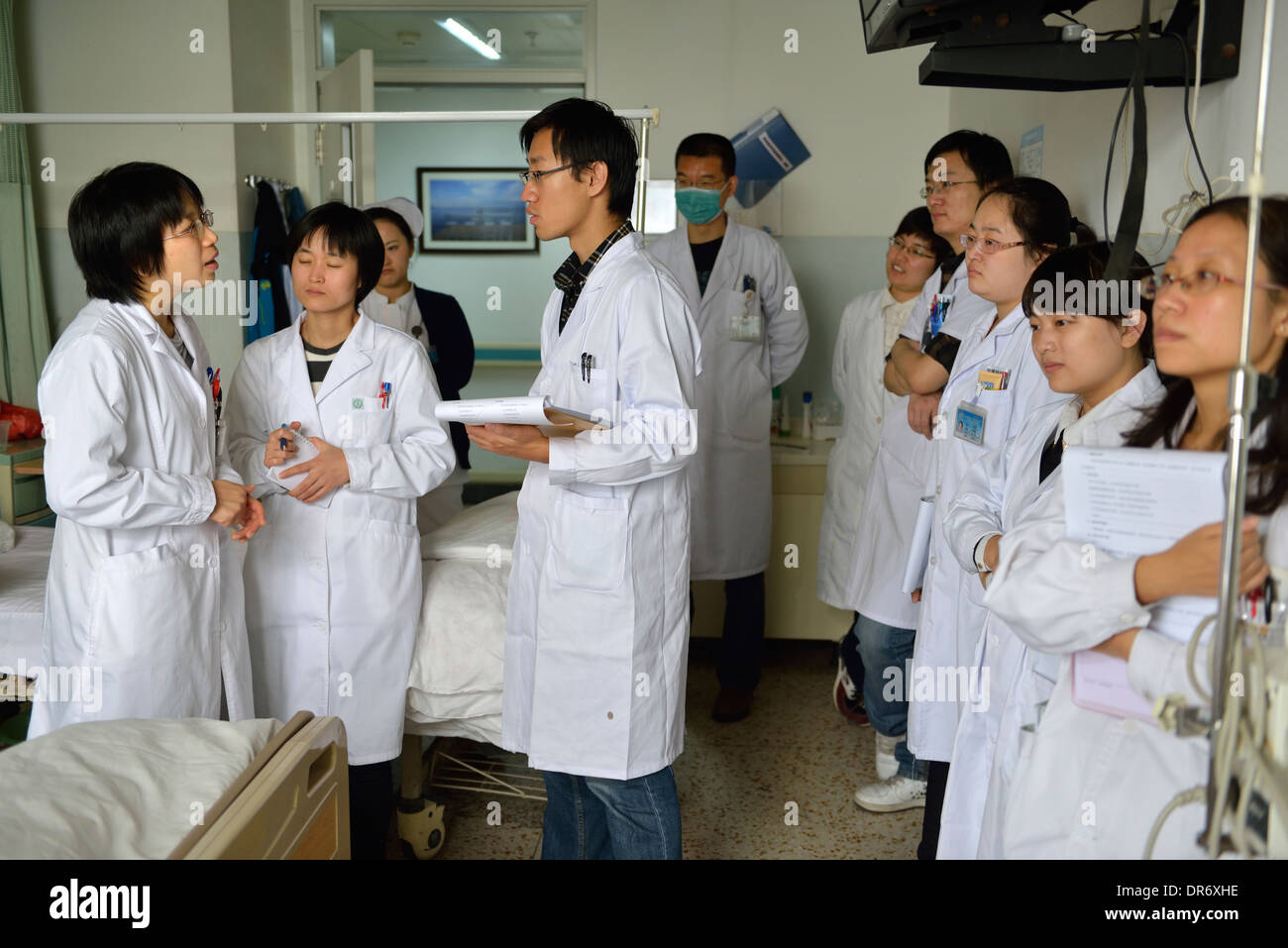Doctors and nurses daily shift meeting in Beijing Cancer Hospital. 18-Oct-2013 Stock Photo