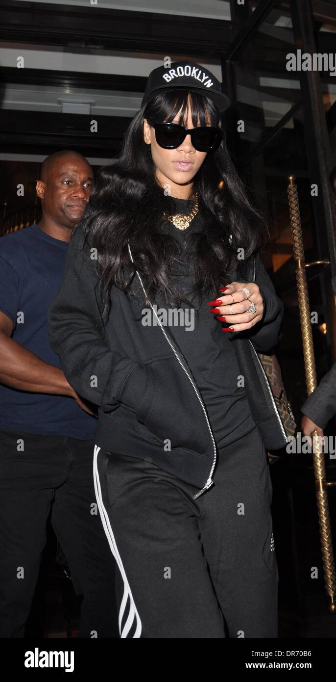 Rihanna exits her hotel wearing an adidas track suit and a Brooklyn hat  London, England - 28.06.12 Stock Photo - Alamy