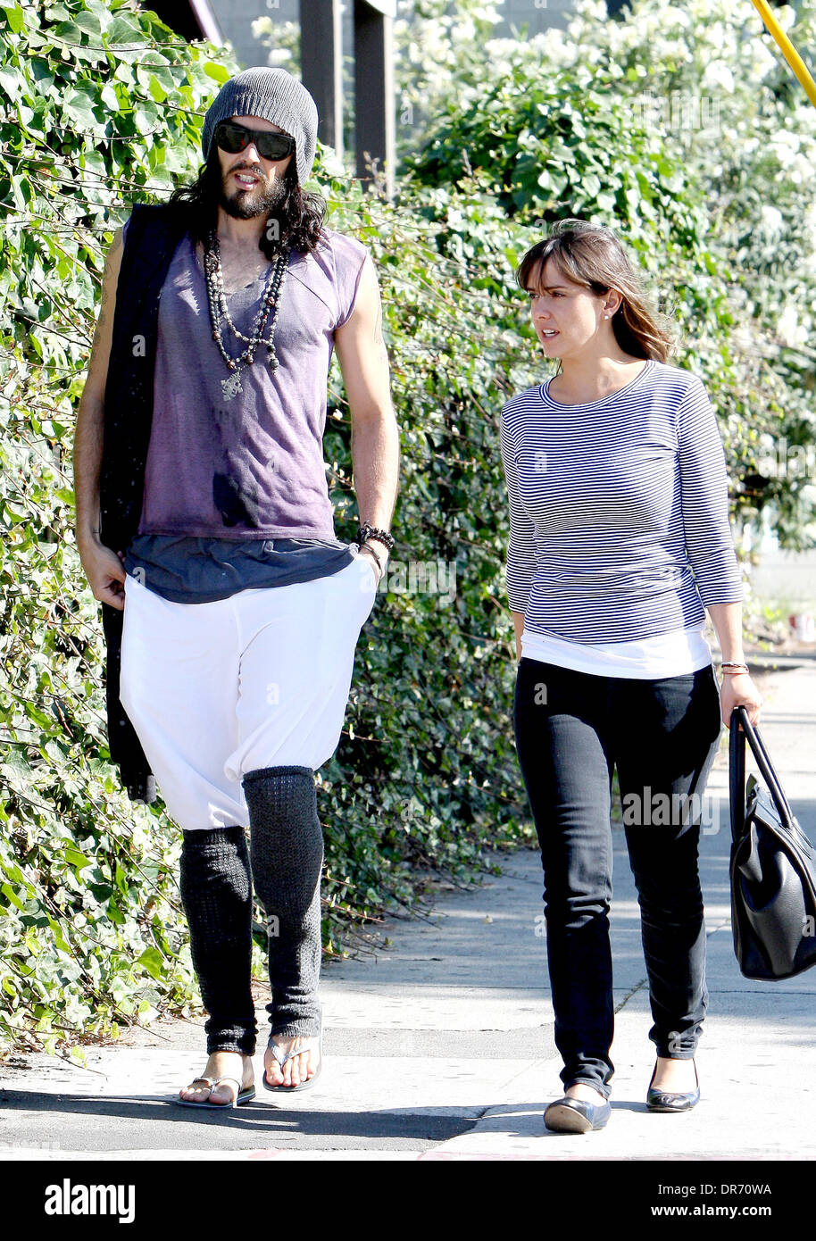 Russell Brand whose new talk show, 'Brand X' premiered last night, is  spotted leaving West Hollywood Lions Club with a friend. Brand is wearing a  winter hat and leg warmers in the