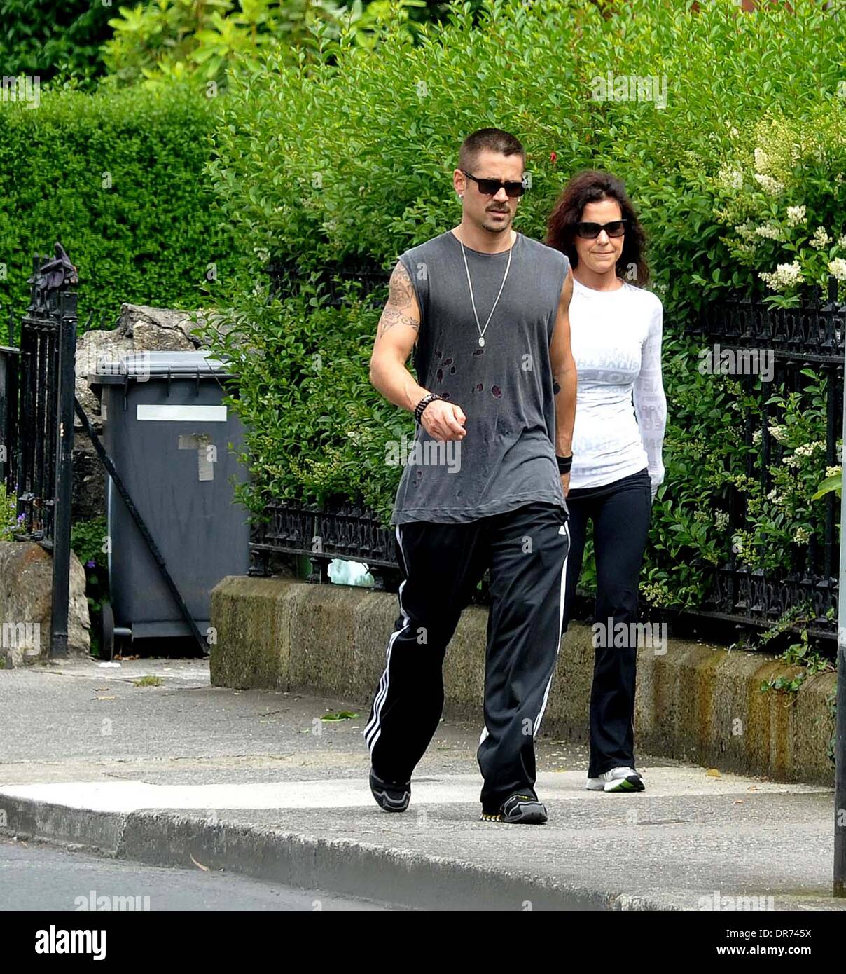 Colin Farrell and Claudine Farrell Colin Farrell dressed casually in Adidas  tracksuit bottoms as he goes for a power walk with his sister along  Sandymount Strand Dublin, Ireland - 05.07.12 Stock Photo - Alamy