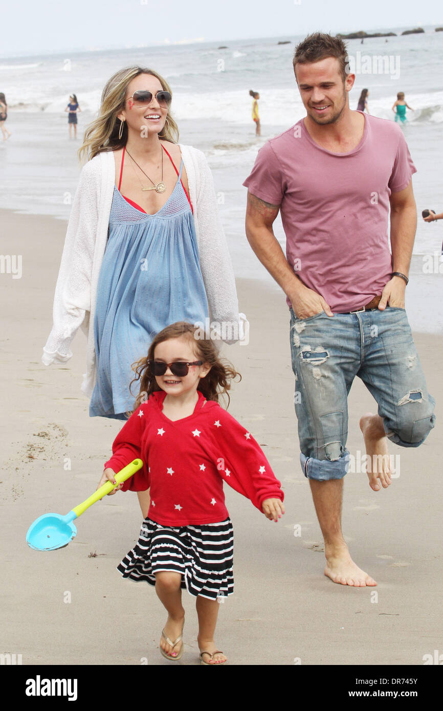 Cam Gigandet and his wife Dominique Geisendorff walk with their daughter  Everleigh Ray Gigandet on the beach in Malibu on the 4th of July Los  Angeles, California - 04.07.12 Where: United States
