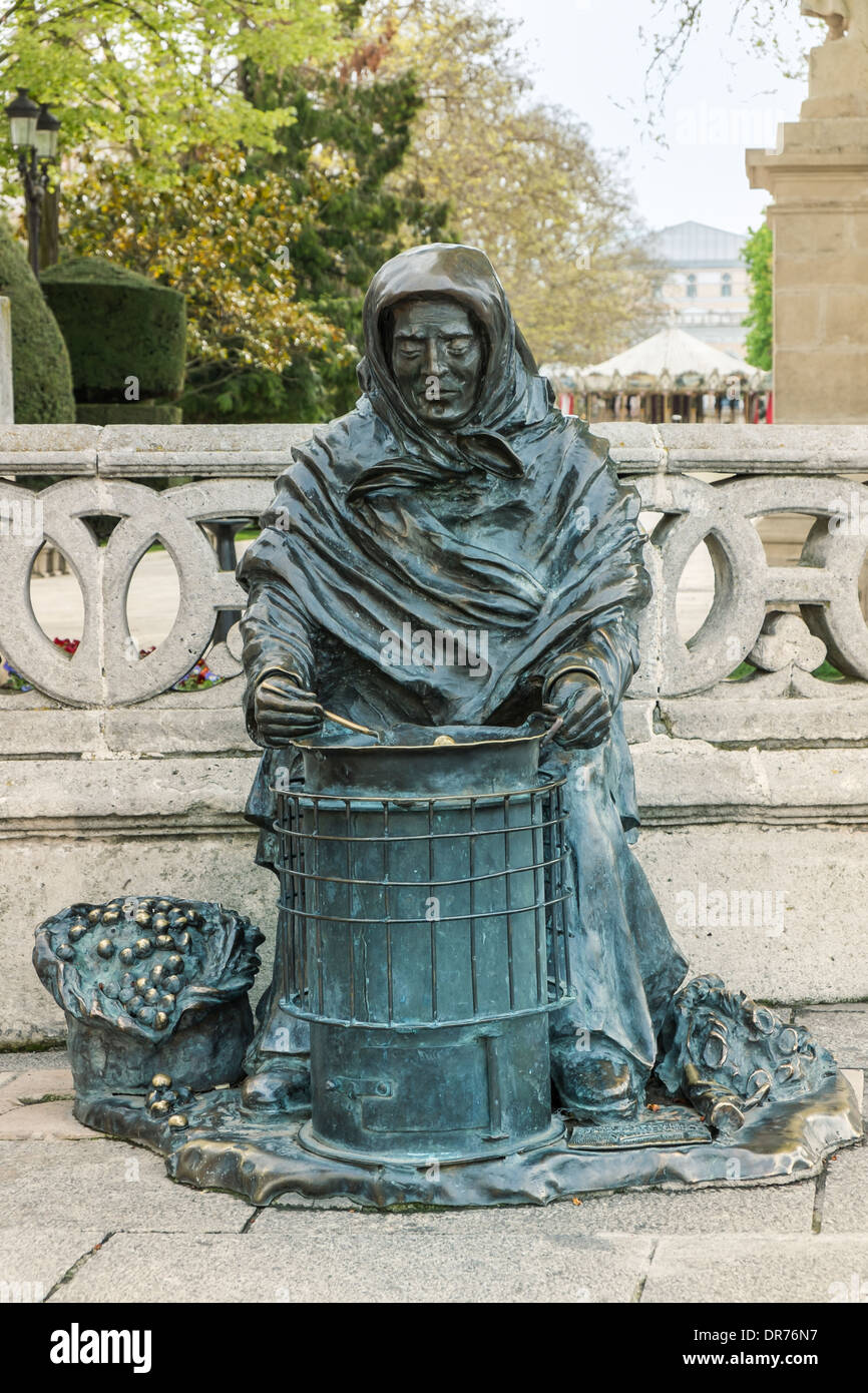 Spain, Burgos, Statue of a roasted chestnut vendor Stock Photo Alamy