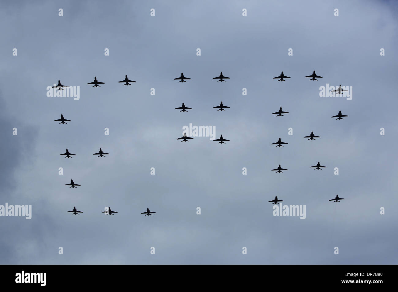 A special formation  flypast of 27 RAF Hawk aircraft in celebration of HRH's Silver Jubilee at RAF Fairford. Stock Photo
